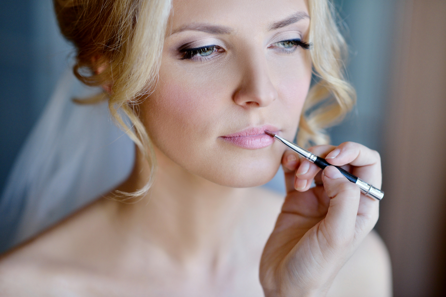 Bride getting make up