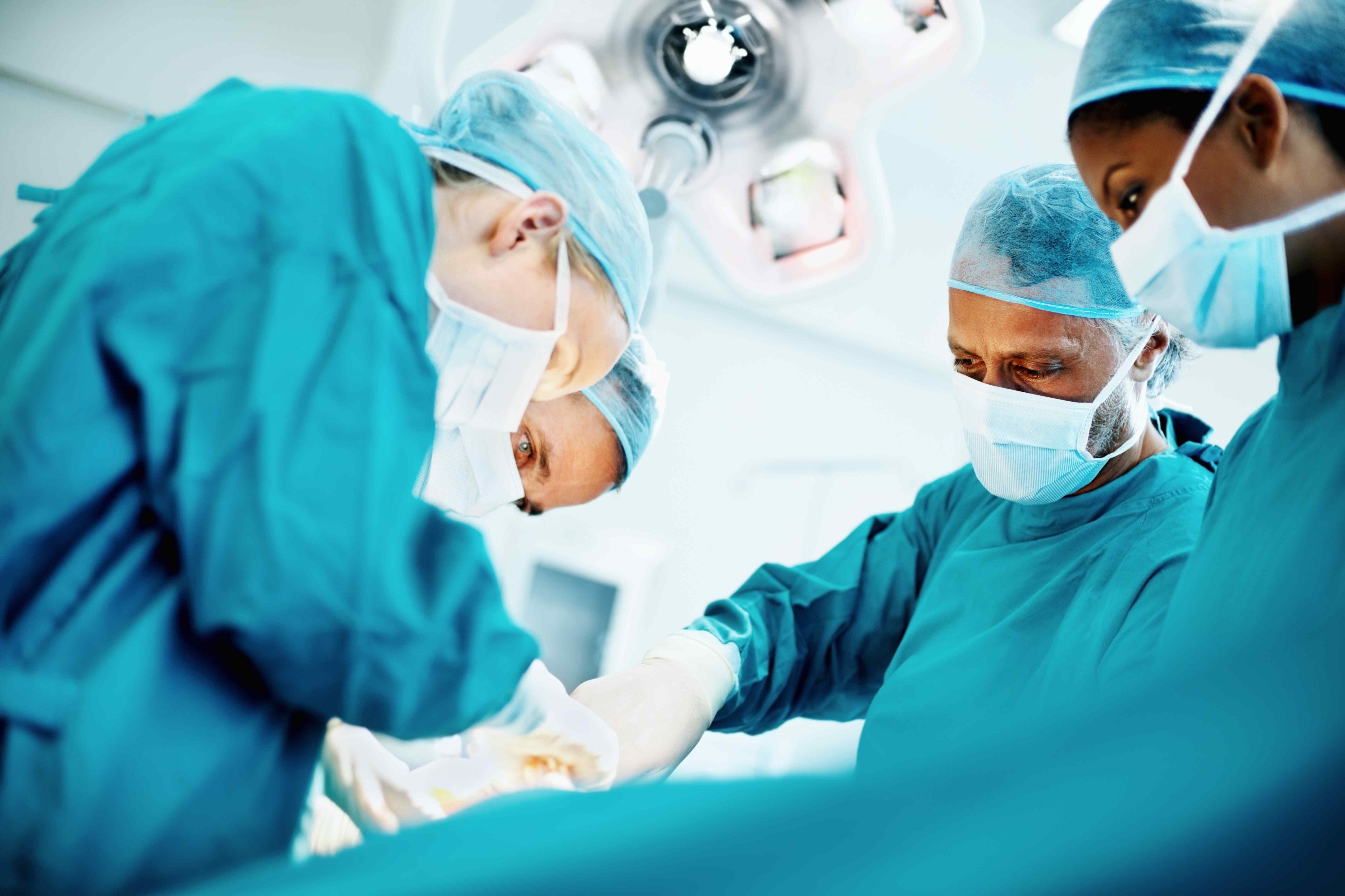surgeons doing a procedure