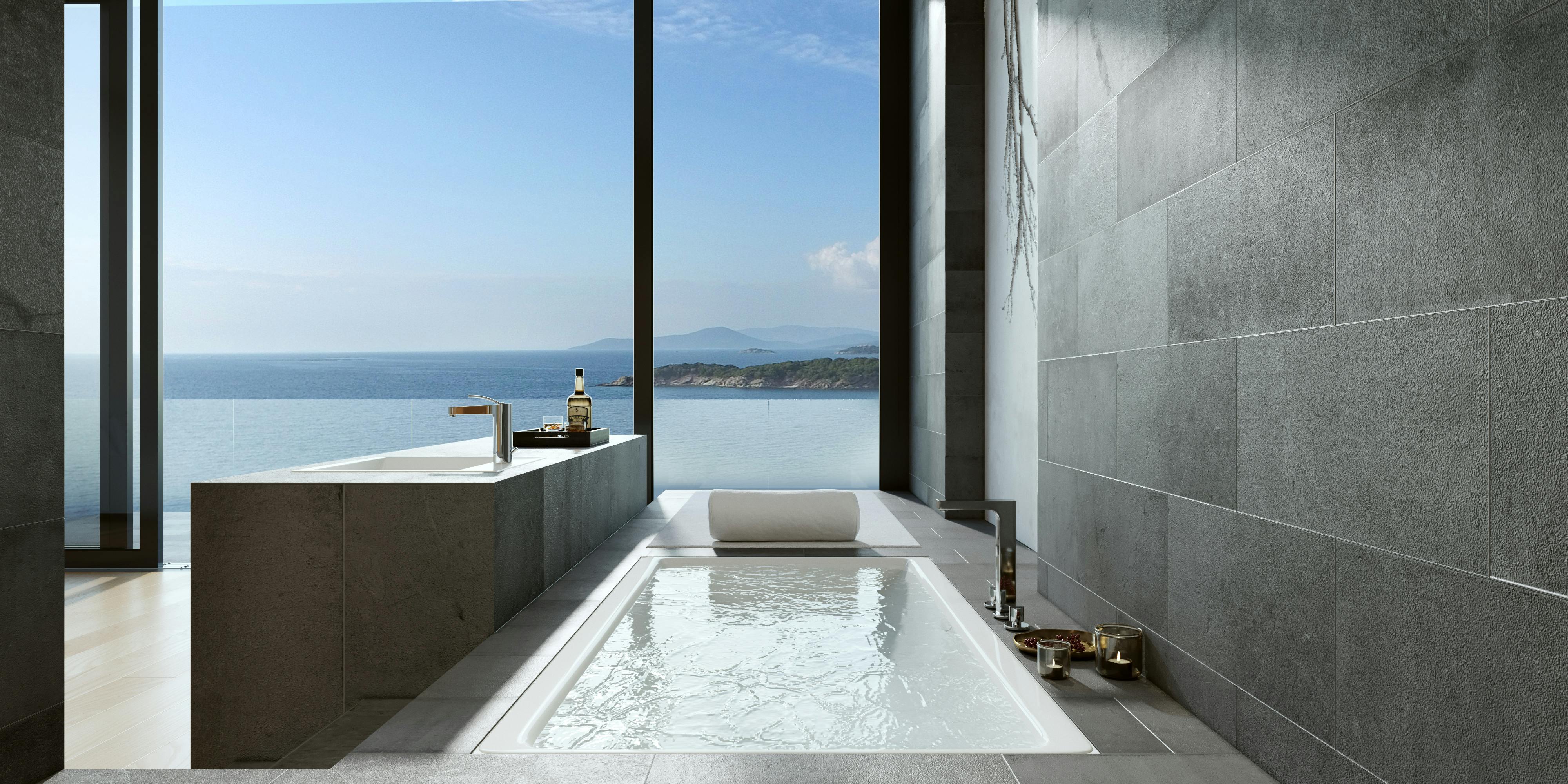 A bright, luxurious spa-like bathroom with a standalone soaking tub and gold fixtures.