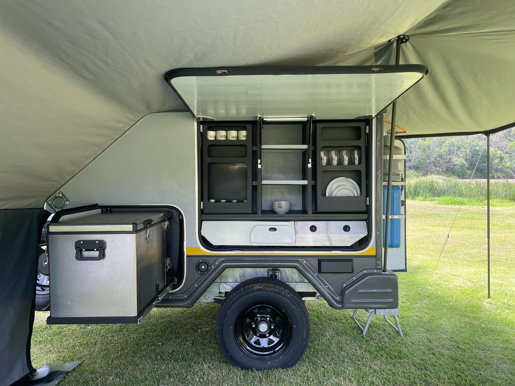 Slide-out fridge fully extended and open