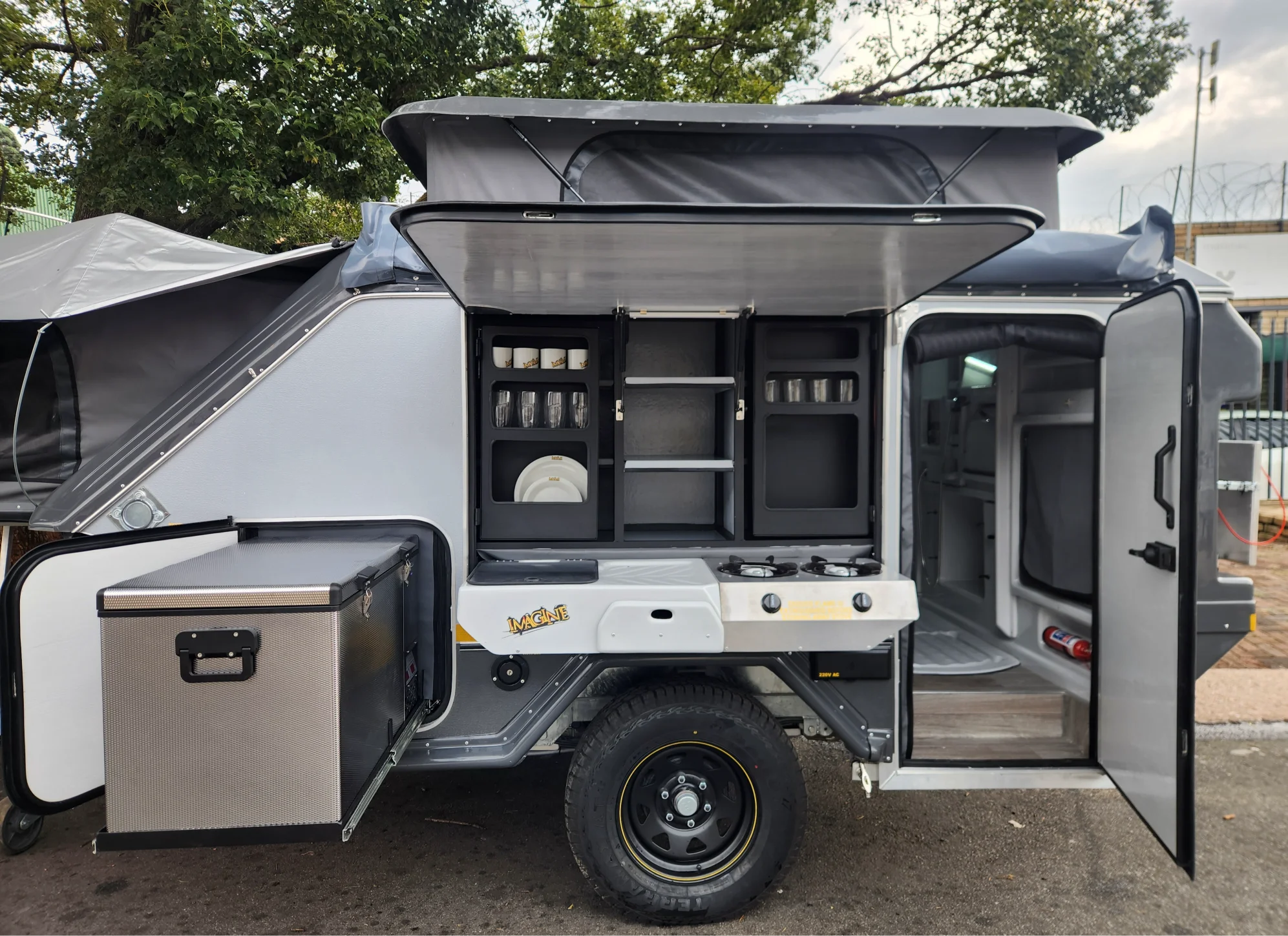 Full kitchen area with outer hatch open