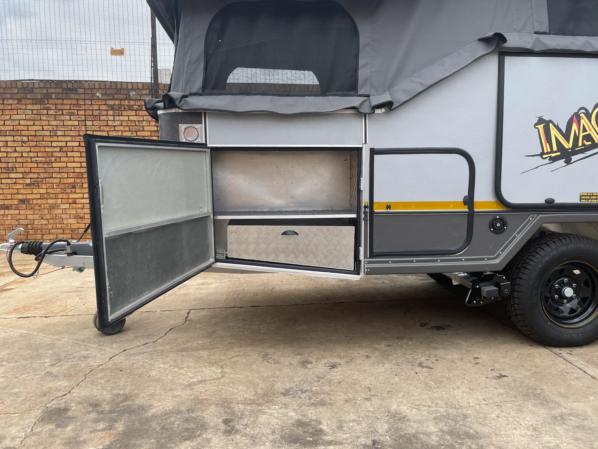 Left side exterior with all storage open