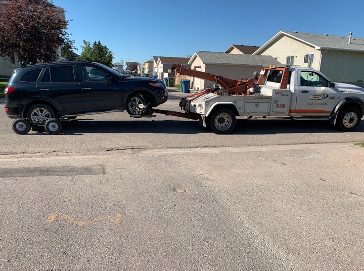 car towing car towing