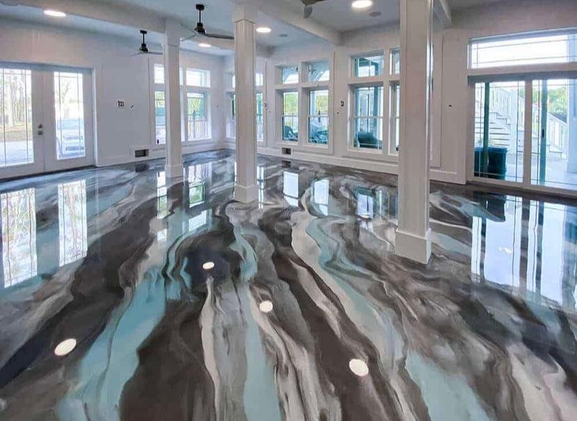 Luxurious high-grade metallic epoxy flooring enhancing a modern living room with its glossy finish.