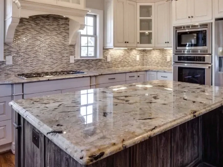 a modern kitchen remodeling with a glossy granite island and stylish tile backsplash.