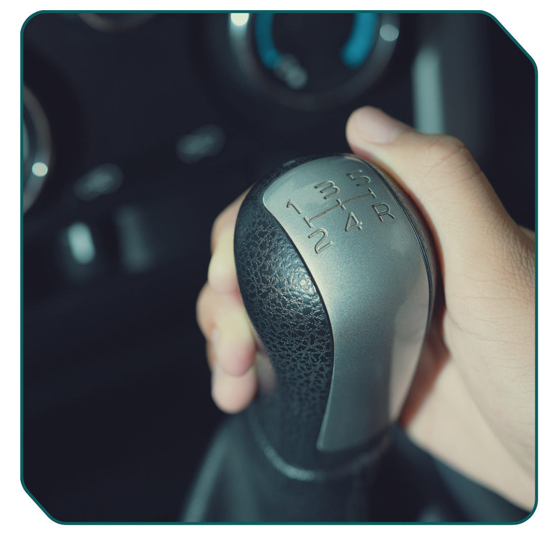 Image of a gear shift on a manual car. Image of a gear shift on a manual car.