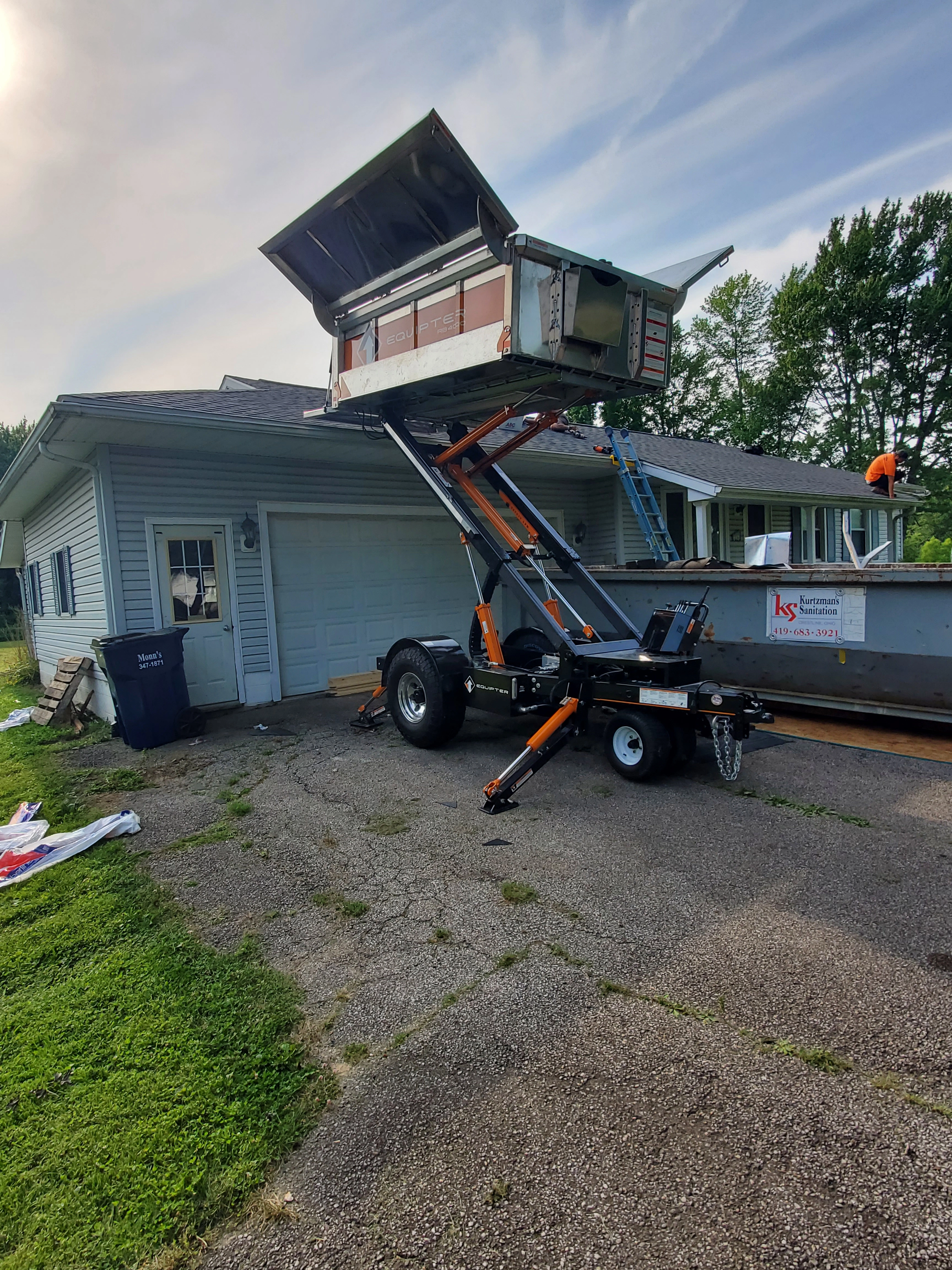 Equipter RB4000 roofing trailer used by Weikles Roofing for clean debris removal