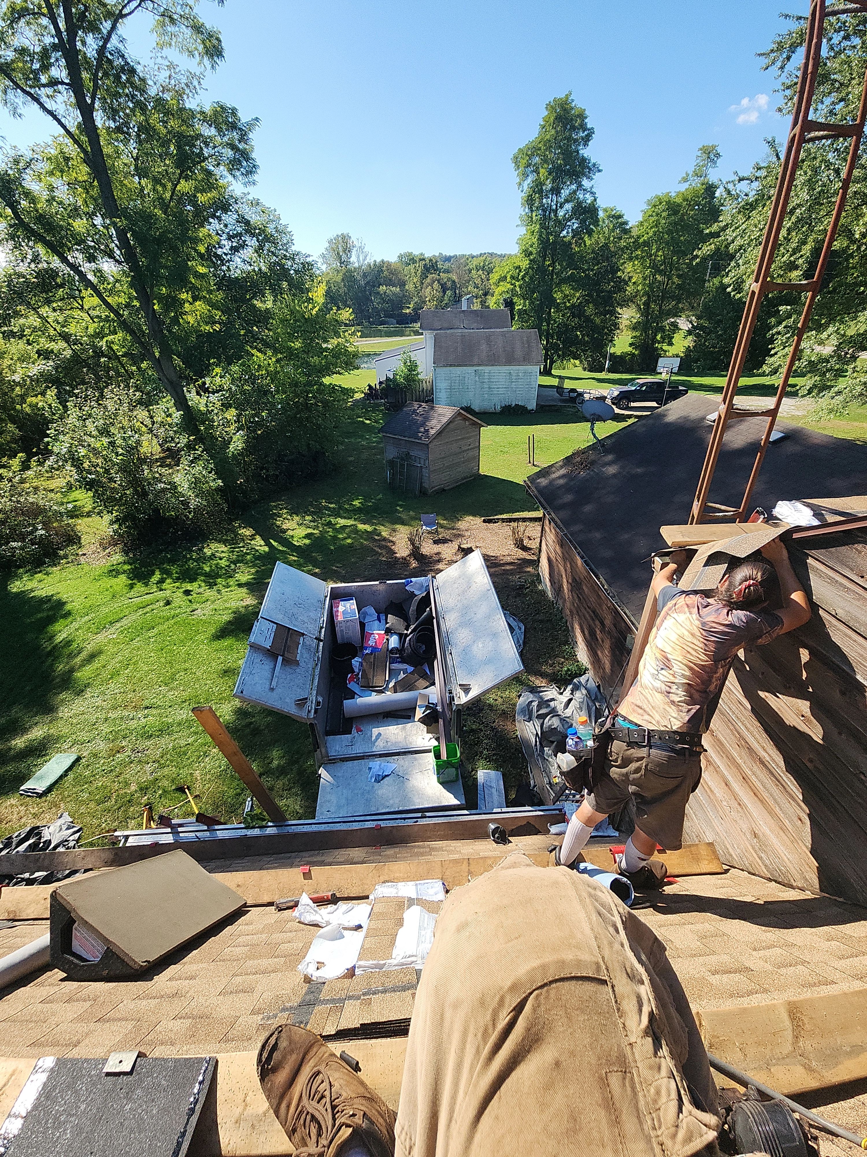 Weikles Roofing in-house crew performing a residential roof replacement in Ashland County Ohio. Weikles Roofing in-house crew performing a residential roof replacement in Ashland County Ohio.