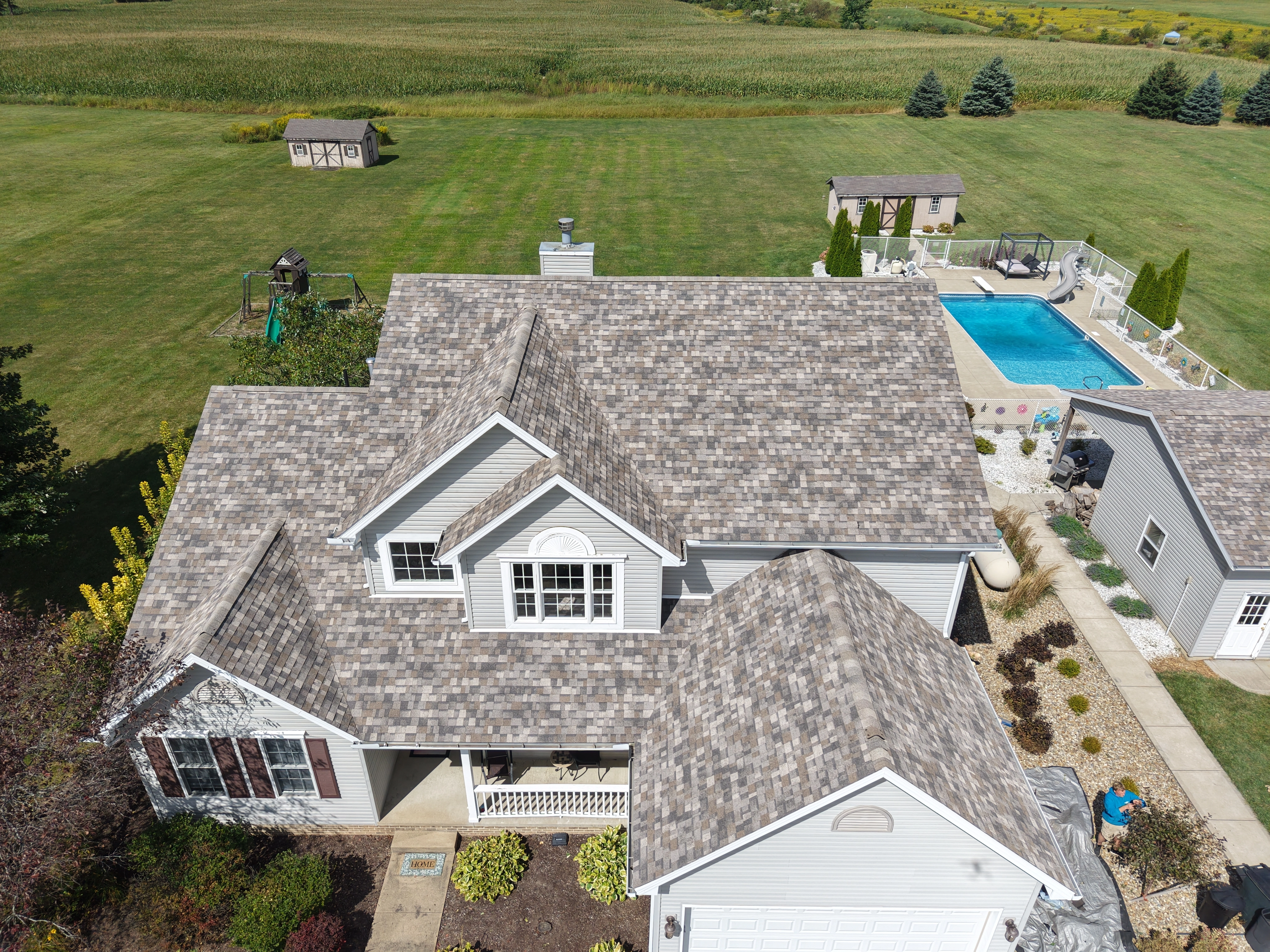 Weikles Roofing crew working on a roof replacement in Perrysville Ohio
