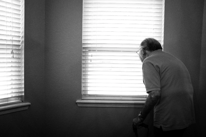Elderly man waiting for his companion caregiver provided by Preferred Care at Home - Gallatin, through Sumner In-Home Care