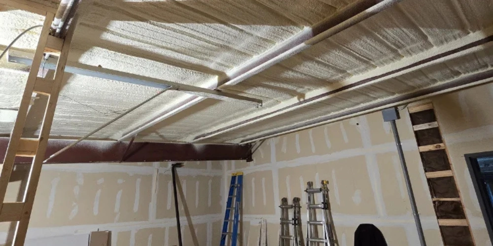 Close-up of dense closed cell spray foam application
