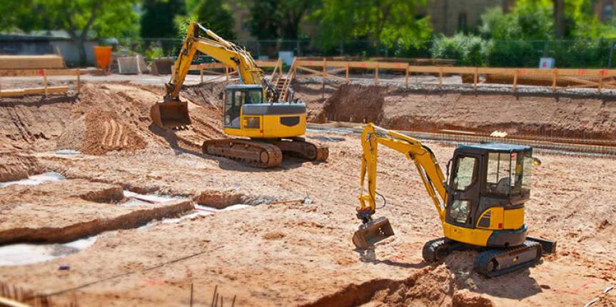 Heavy equipment performing land clearing work