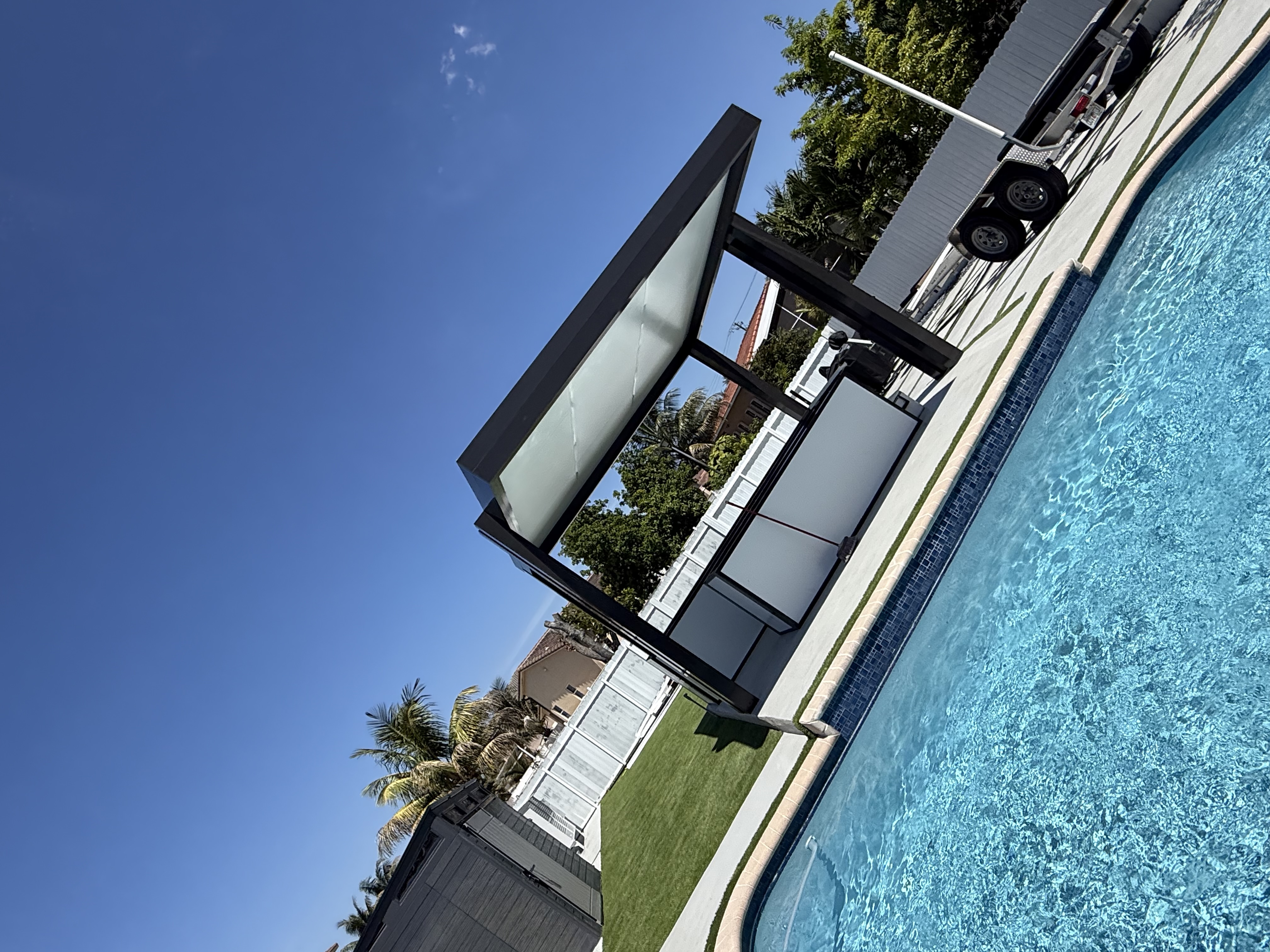 Aluminum pergola with louvered roof and clean architectural lines