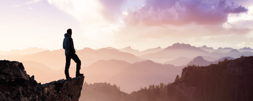 Silhouetted man standing on a mountain peak at sunrise, symbolizing resilience, high performance, and the transformative journey of the Optimal AF program. Silhouetted man standing on a mountain peak at sunrise, symbolizing resilience, high performance, and the transformative journey of the Optimal AF program.