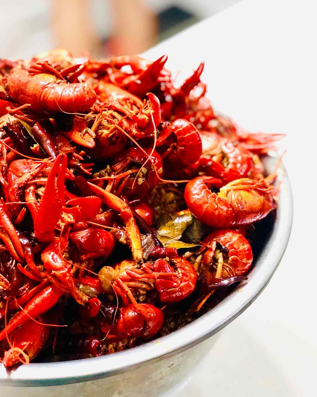 A bowl full of cooked shellfish, such as crawfish, which are a common trigger for serious food allergies and can cause reactions ranging from hives to anaphylaxis. A bowl full of cooked shellfish, such as crawfish, which are a common trigger for serious food allergies and can cause reactions ranging from hives to anaphylaxis.