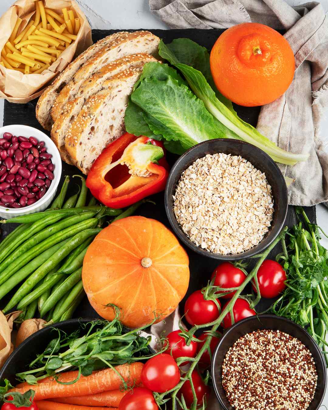 A vibrant assortment of whole foods including grains, legumes, vegetables, and fruits—many of which are nutritious but can trigger food sensitivities in certain individuals. A vibrant assortment of whole foods including grains, legumes, vegetables, and fruits—many of which are nutritious but can trigger food sensitivities in certain individuals.
