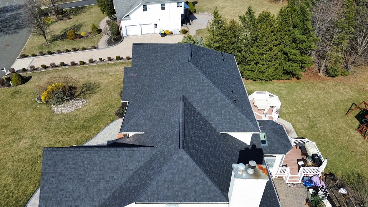 Skylight flashing and roof transition detail on a Warren, NJ roof replacement project