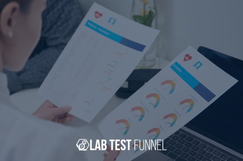 Over-the-shoulder view of a health practitioner in a lab coat reviewing two functional medicine reports, one with data tables and another with colorful gauge-style charts, with the "Lab Test Funnel" logo at the bottom.
