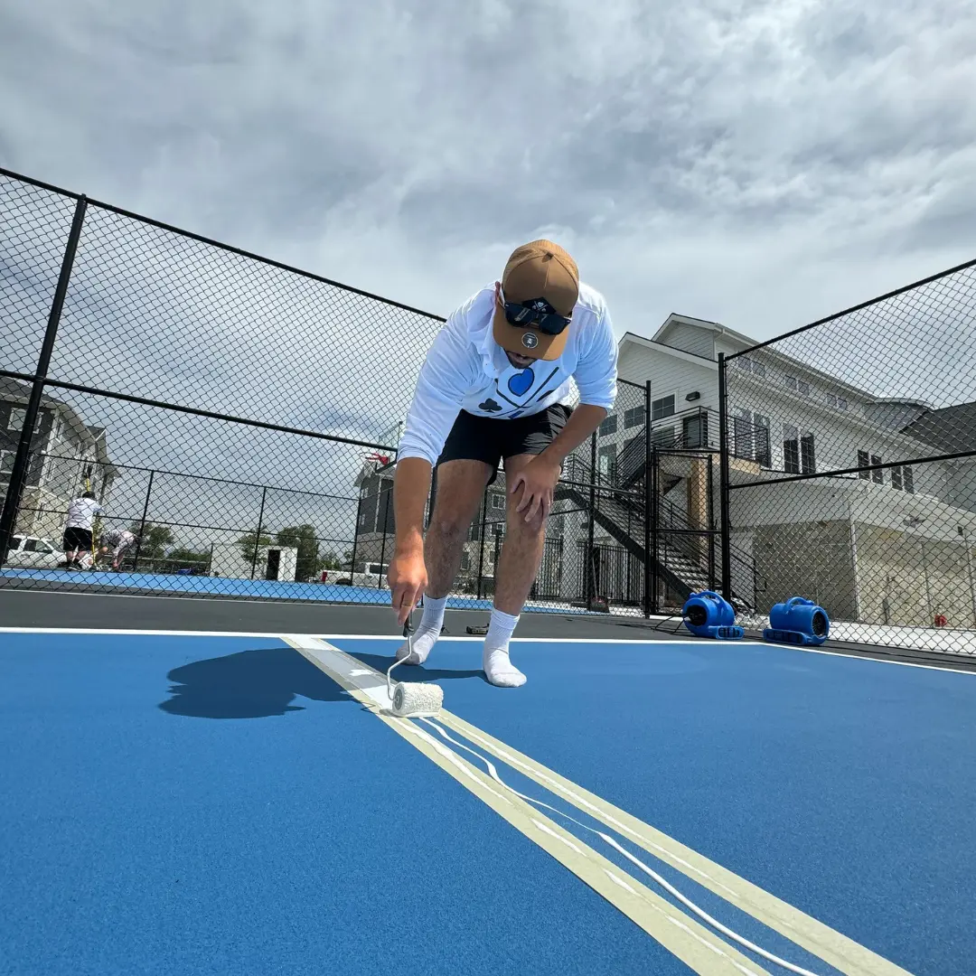 image of painting pickleball lines for topic on pickleball court contractors near me