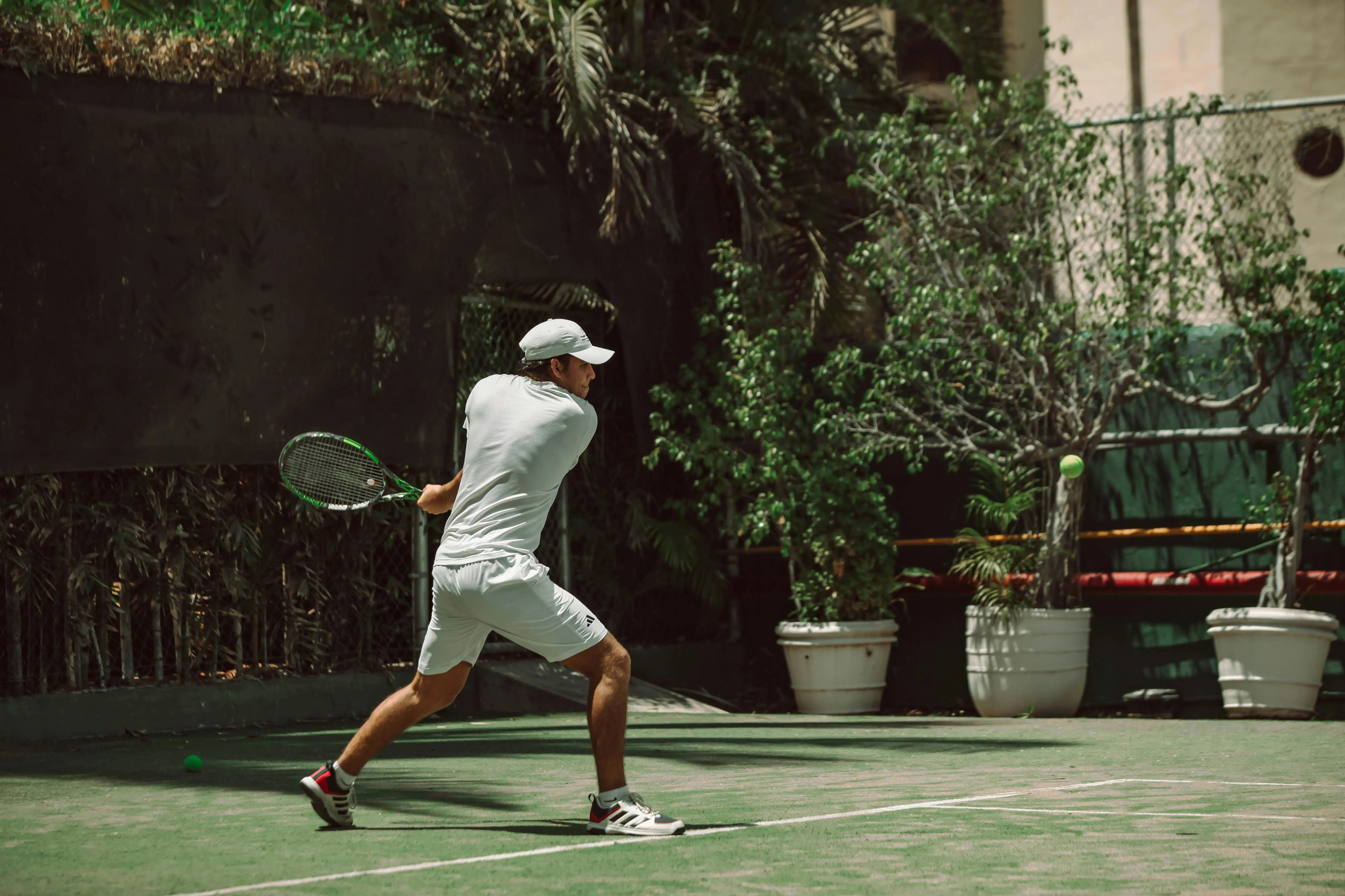 image of a man playing on a residential pickleball courts image of a man playing on a residential pickleball courts