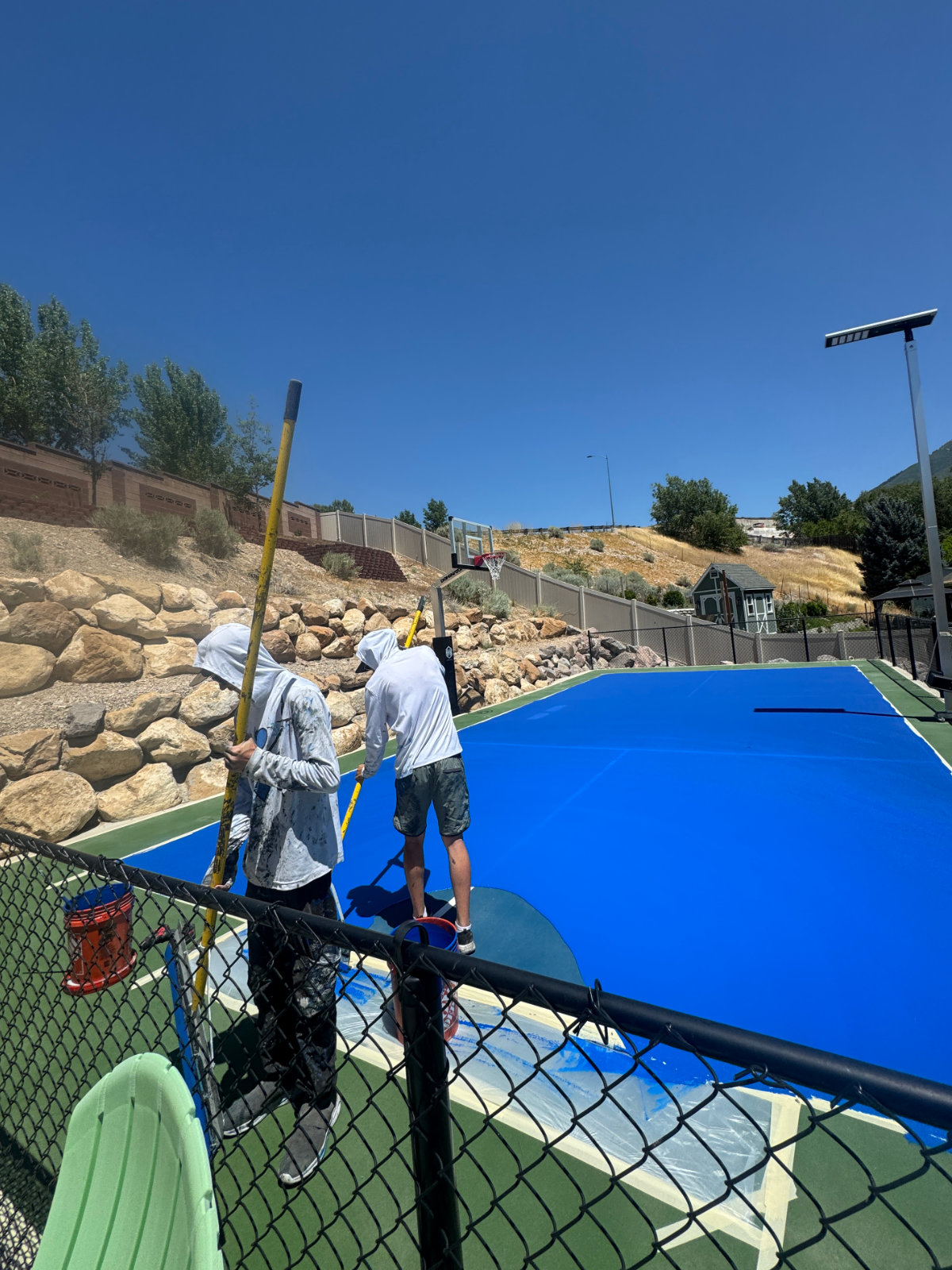 Pickleball court surfacing blue and green line painting