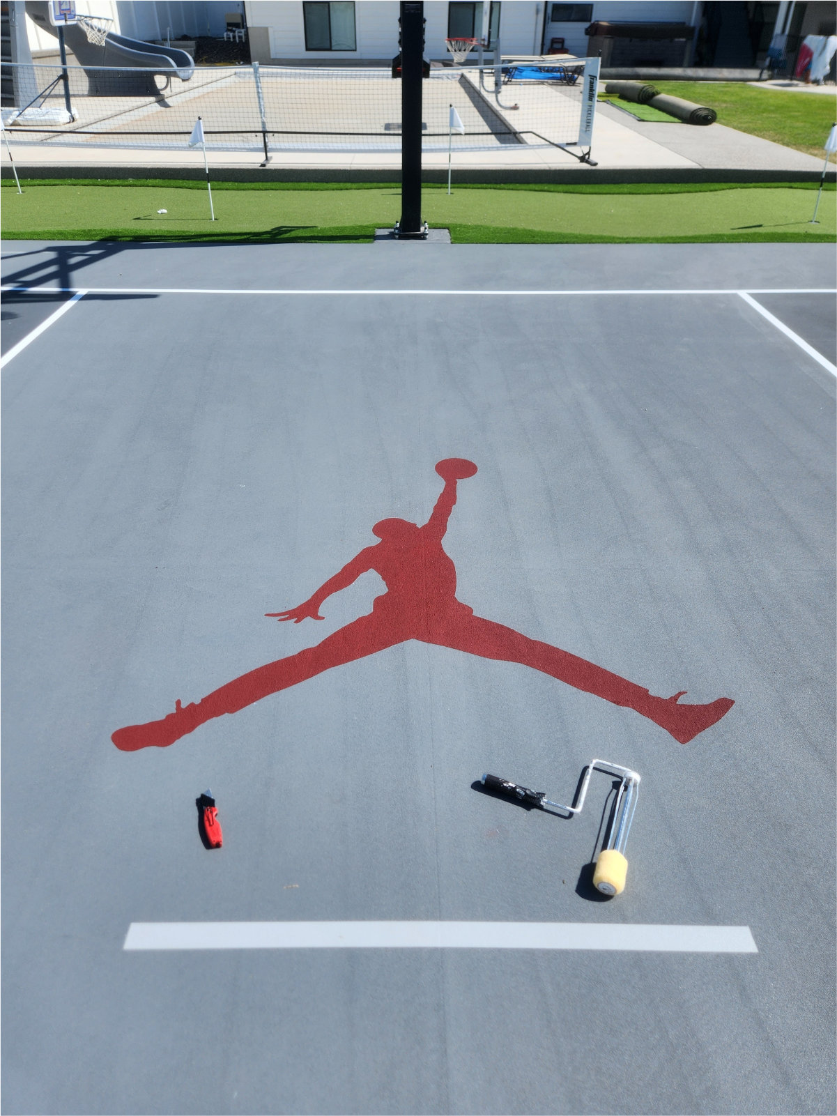 Custom coating paint basketball court with airjordan logo