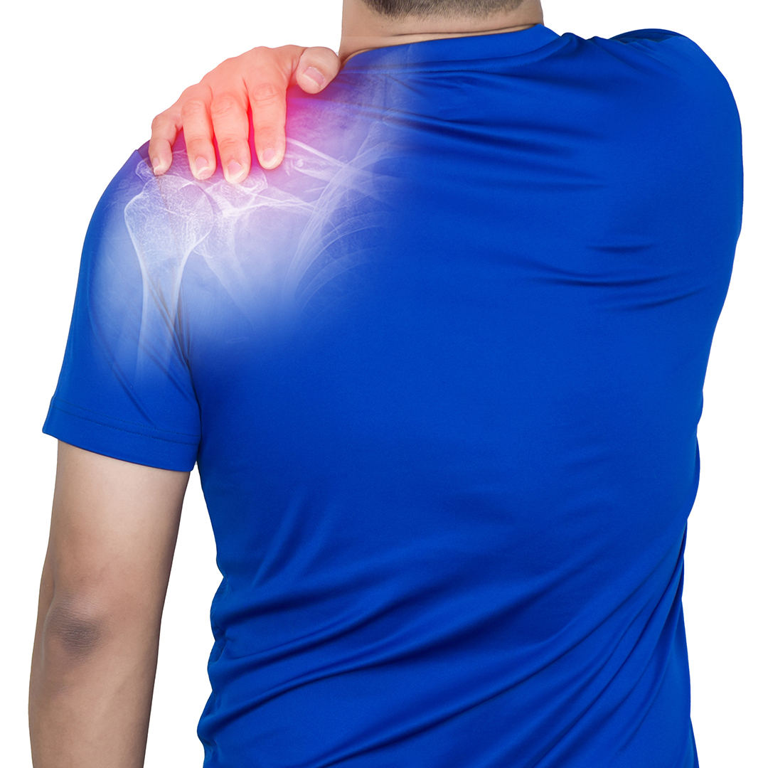 Man holding his shoulder in pain