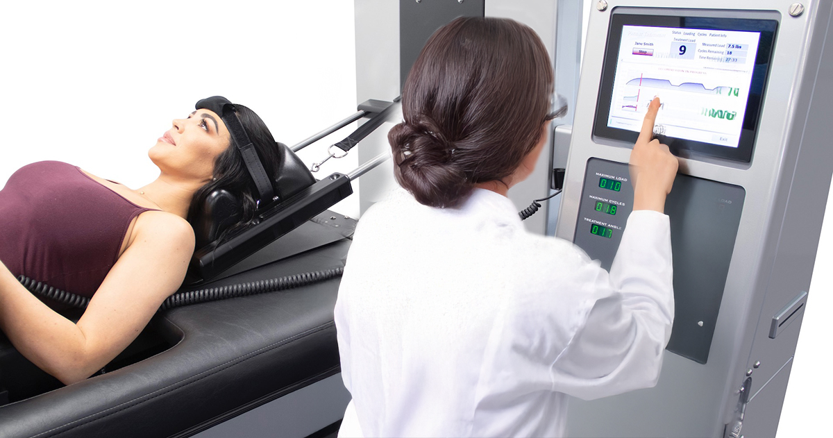 A patient comfortably undergoing non-surgical spinal decompression on a DRX 9000 table at Spine and Sport Rehab Institute in Plantation, FL.