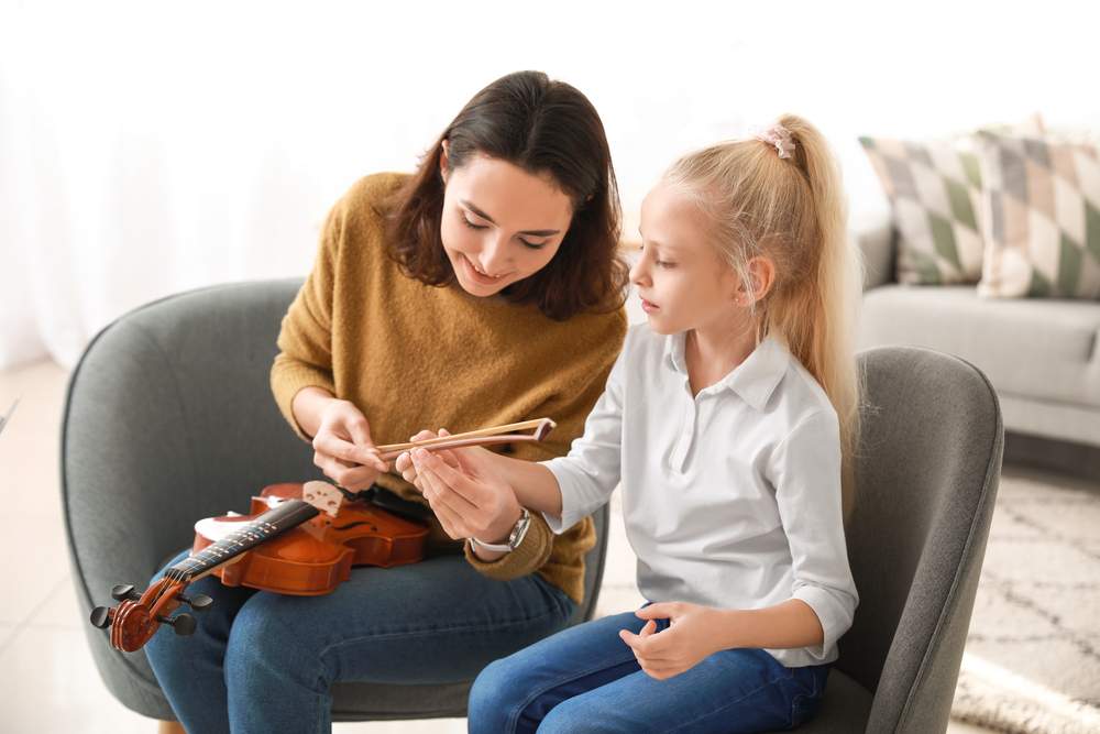 kids learning to play violin in Fort Saskatchewan