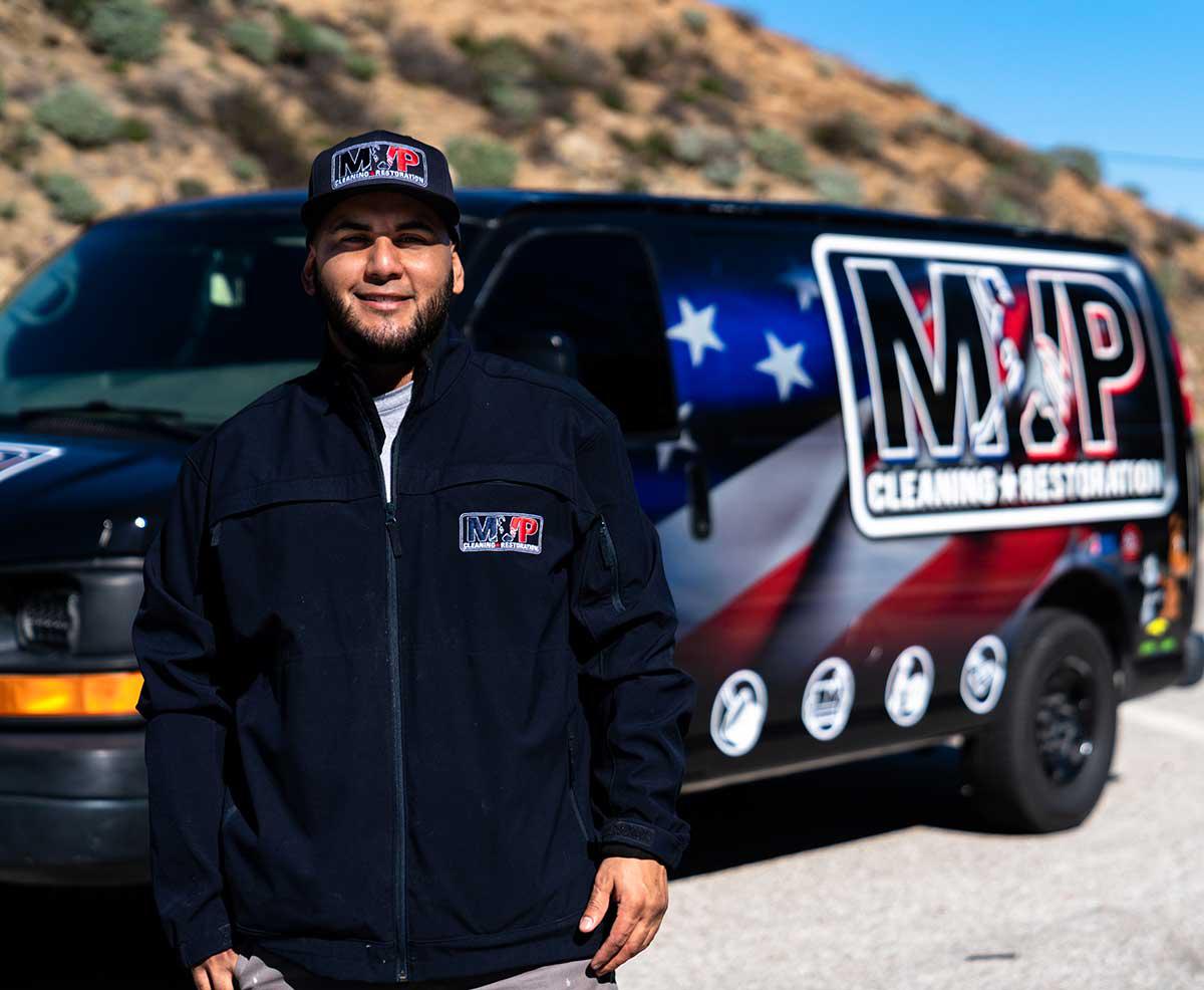 Owner with MVP Cleaning & Restoration service van in Menifee