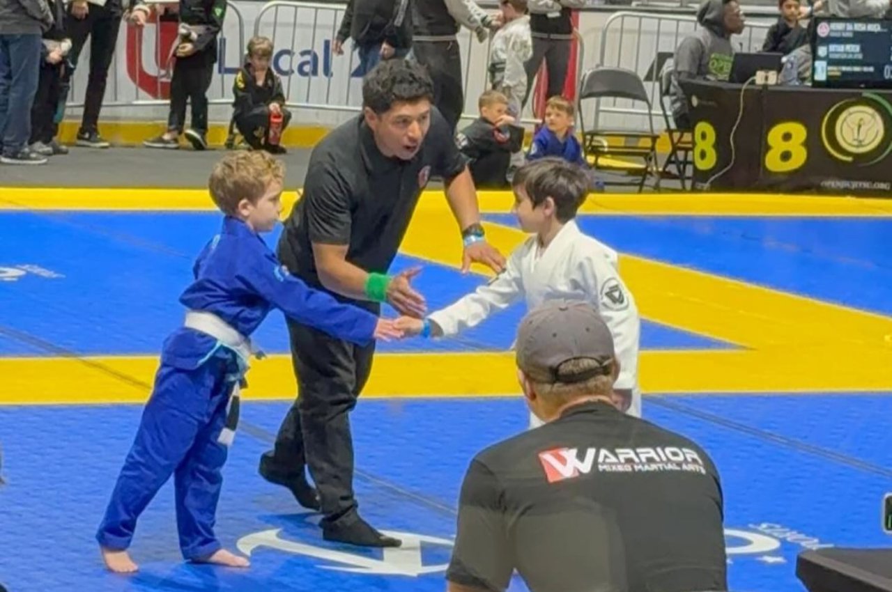 Martial arts instructor with kids