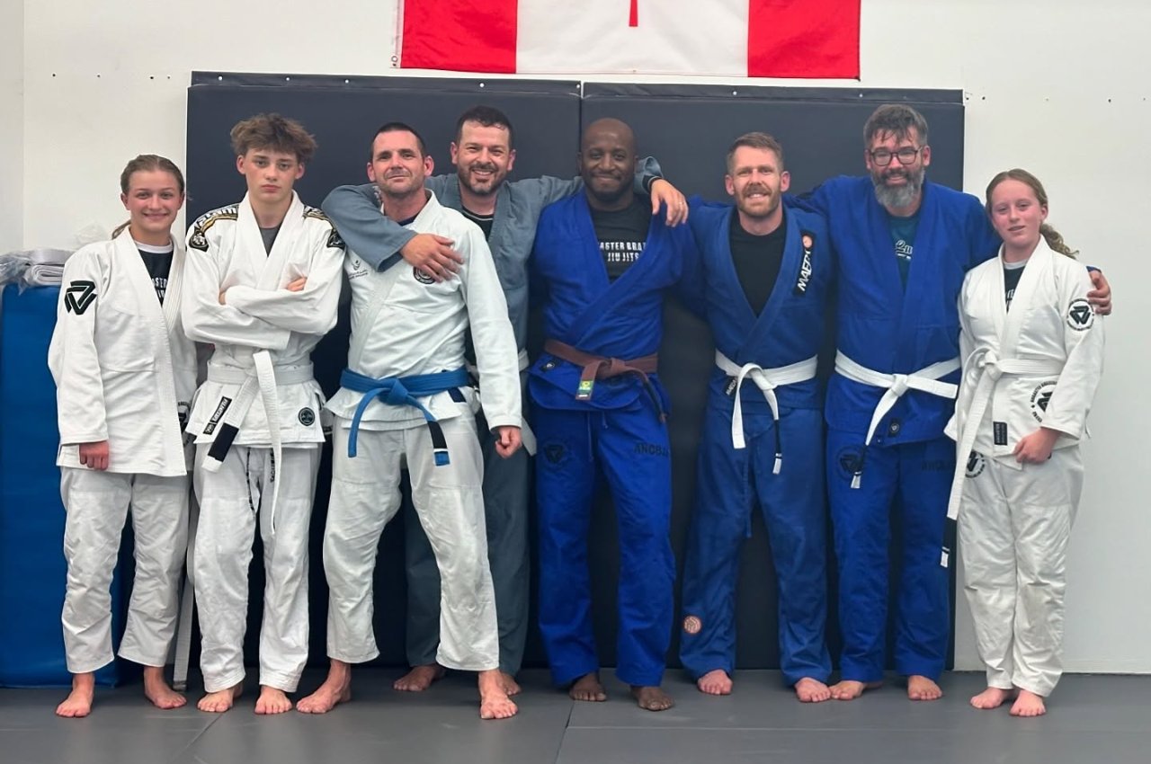 Martial arts instructor with kids