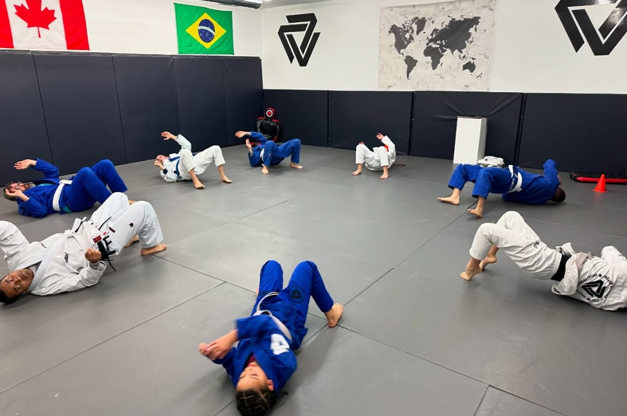 Martial arts instructor with kids