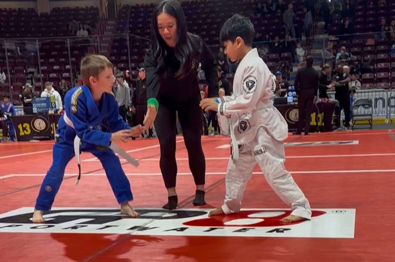 Martial arts instructor with kids