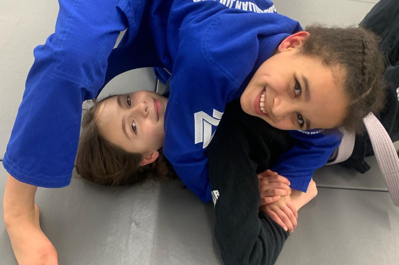 Martial arts instructor with kids
