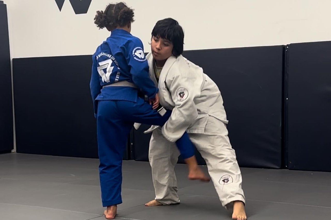 Martial arts instructor with kids