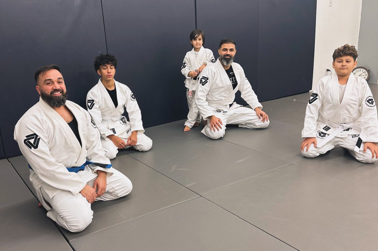 Martial arts instructor with kids
