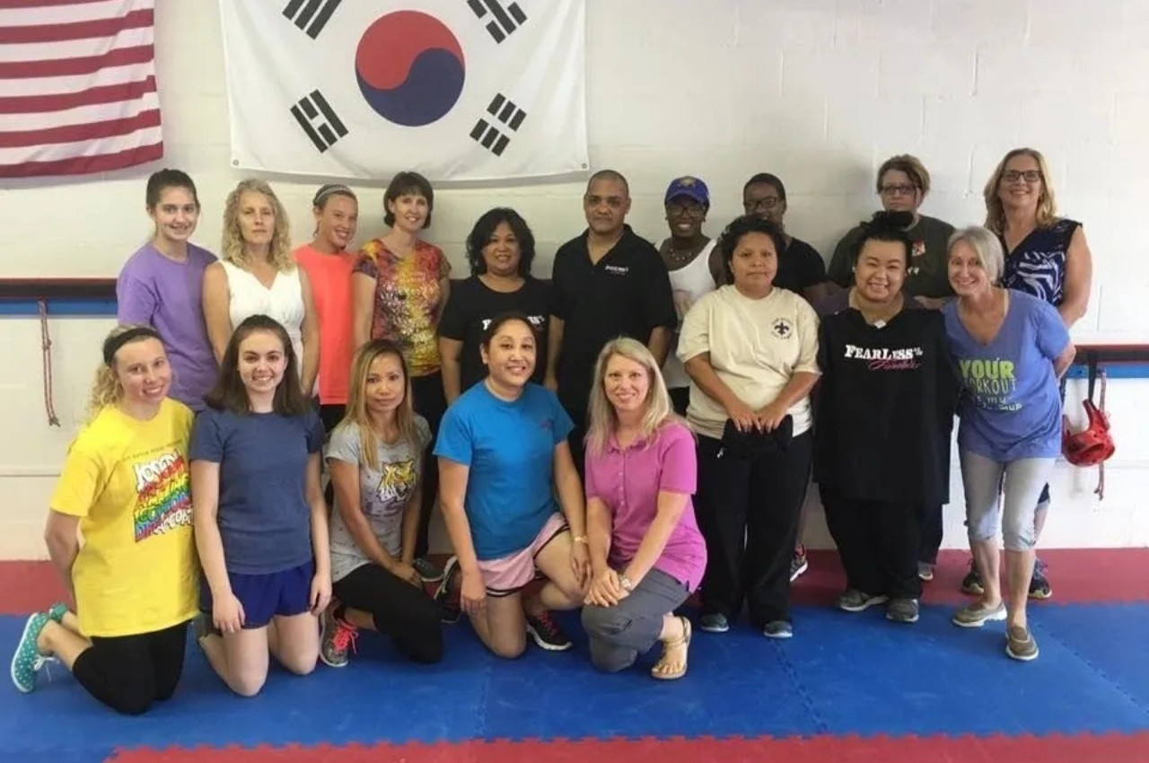 Martial arts instructor with kids