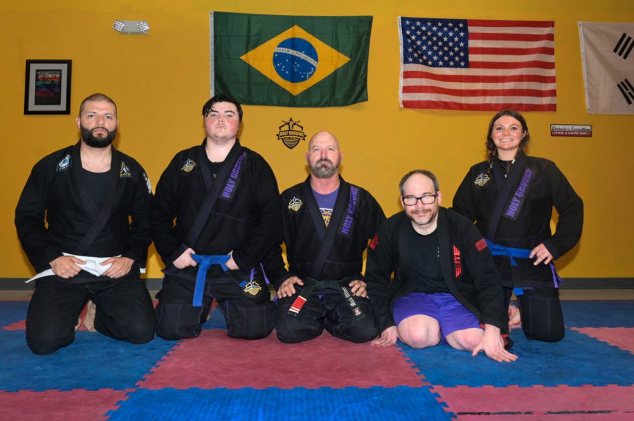 Martial arts instructor with kids