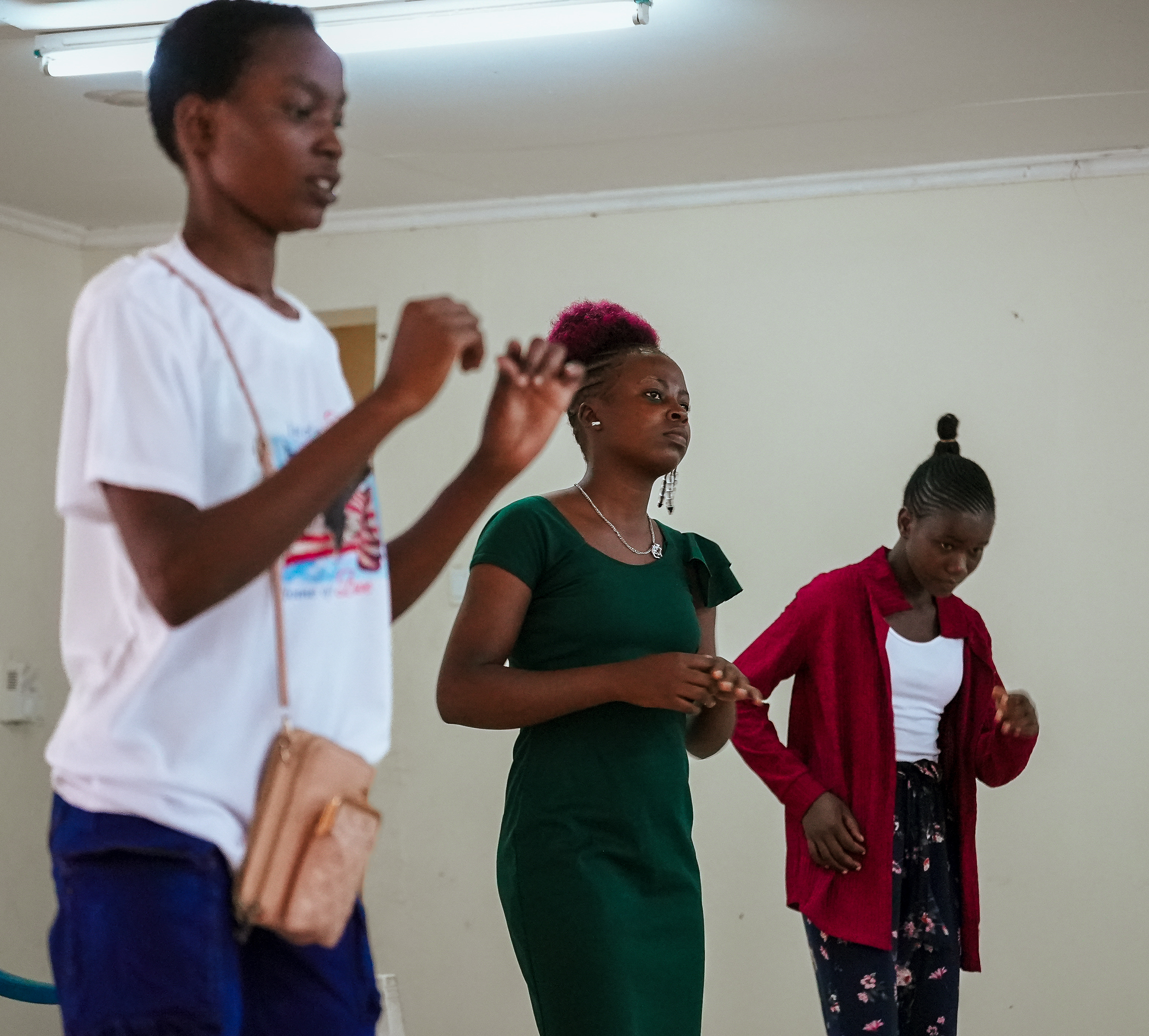 Youth Mentorship Symposium audience in tiered seating.