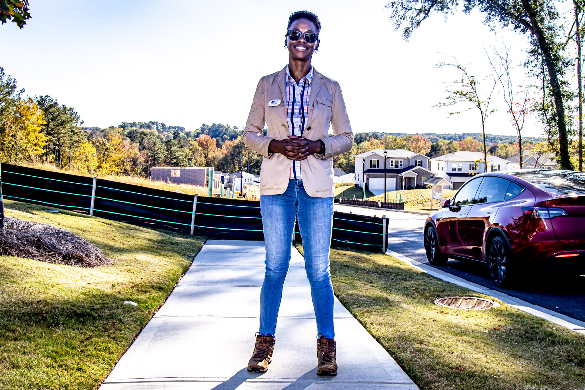 Falecia Terry standing confidently in a new home community