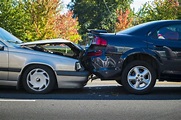 Rear-end collision showing two cars Rear-end collision showing two cars