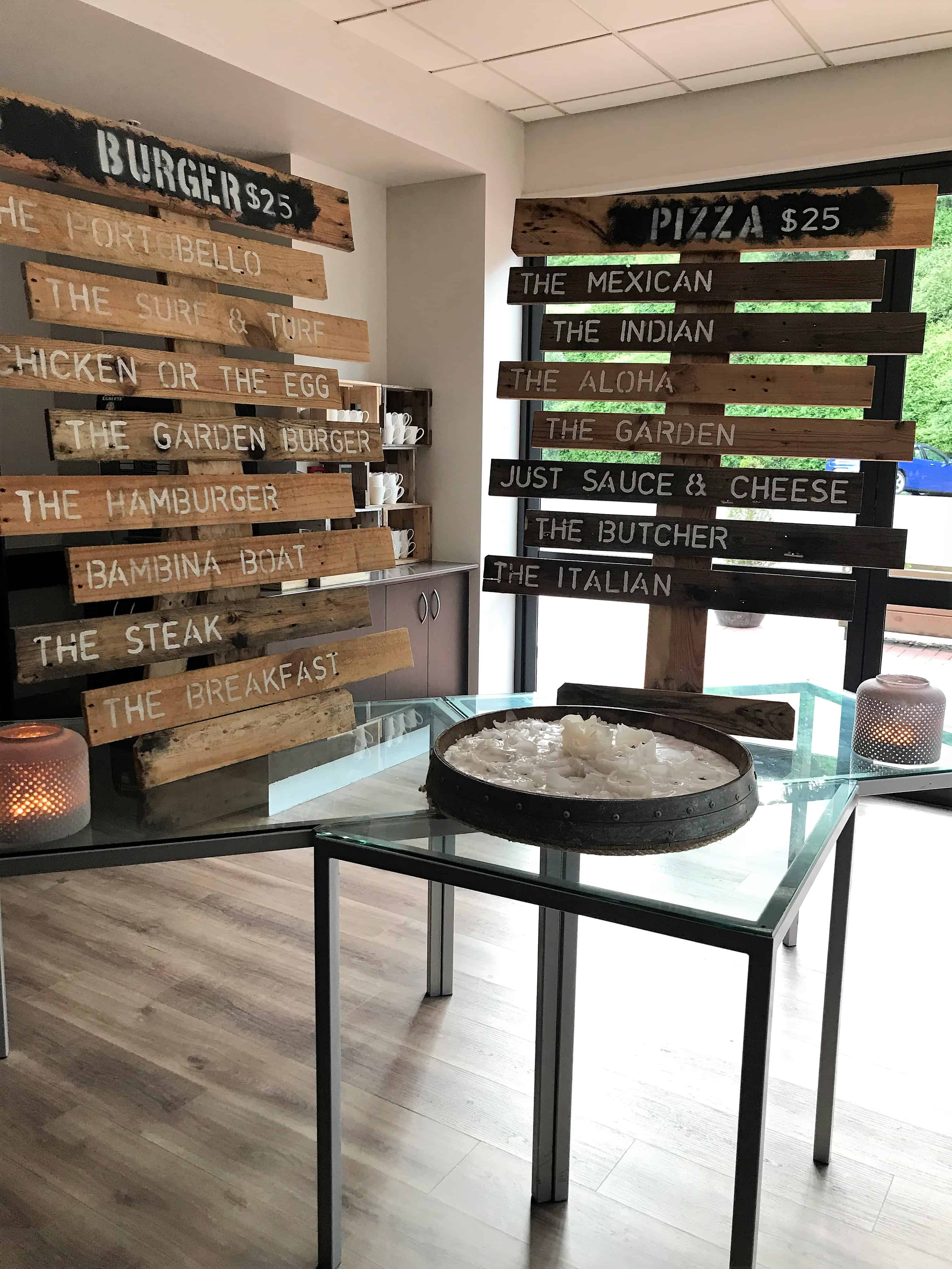 Ibis Hotel lobby with restaurant menu on wooden planks