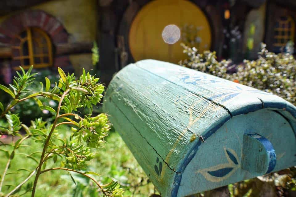 mailbox in front of a hobbit house in Hobbiton