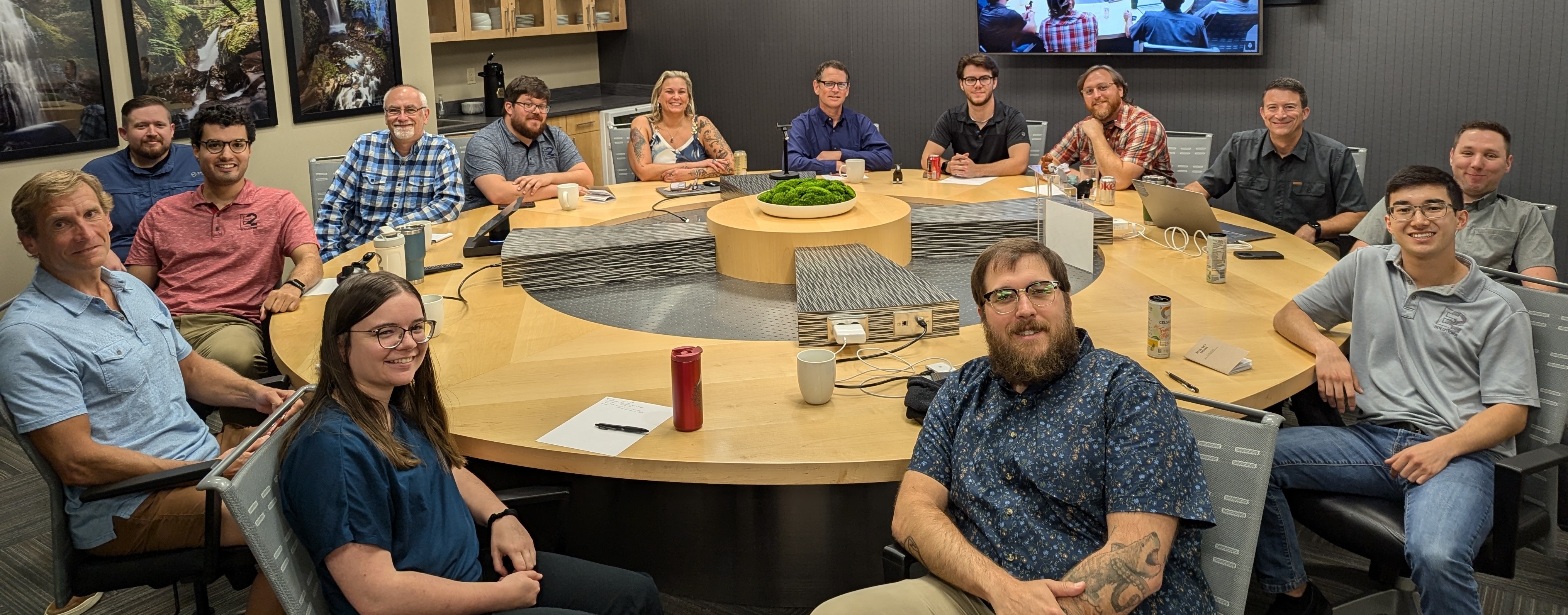 Team meeting in round table room