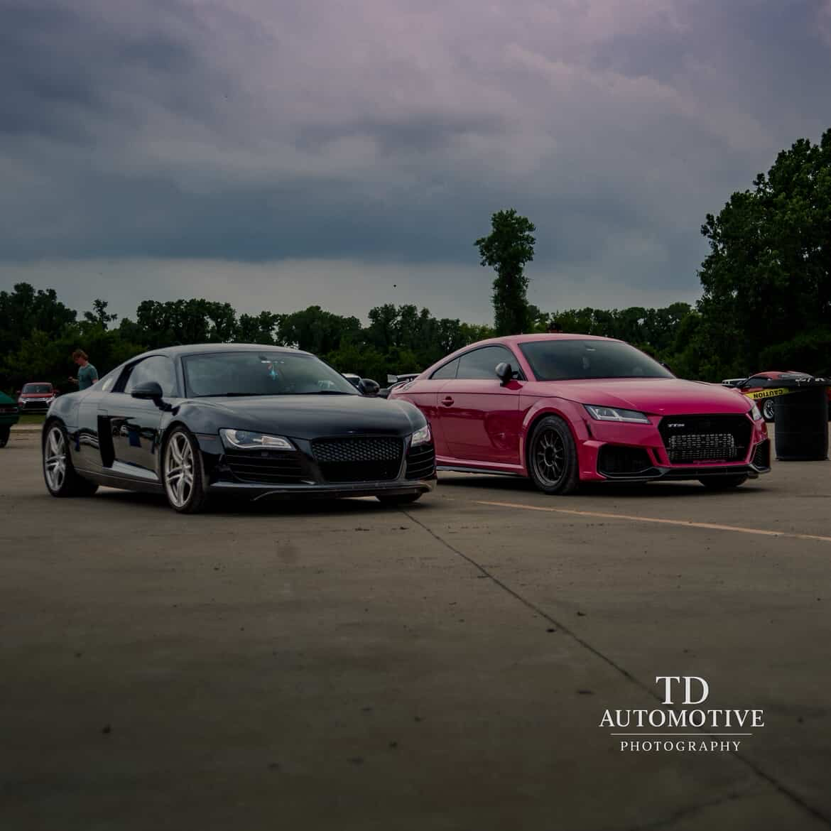 two Audi R8 parked next to one another two Audi R8 parked next to one another