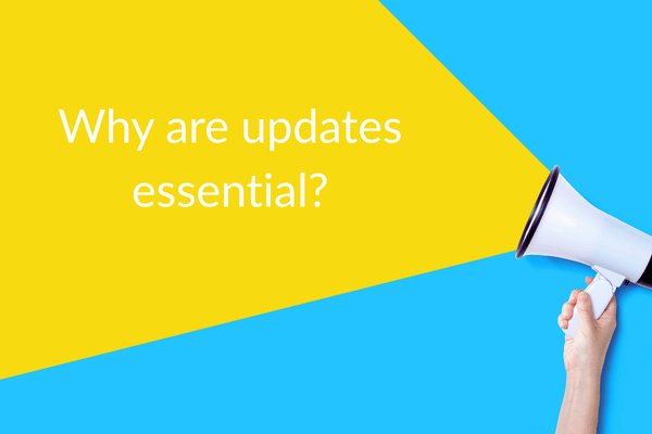 Hand holding up a megaphone with the words "why are updates essential?" representing a discussion around that keeping your device and operating system up to date ensures... Hand holding up a megaphone with the words "why are updates essential?" representing a discussion around that keeping your device and operating system up to date ensures...