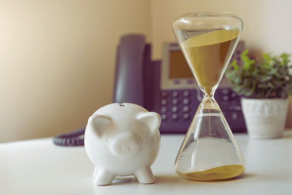 Piggy bank and and sand timer. How much time & money are you losing to poor email management? Piggy bank and and sand timer. How much time & money are you losing to poor email management?
