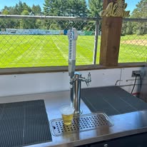 The outside bar next to the softball field