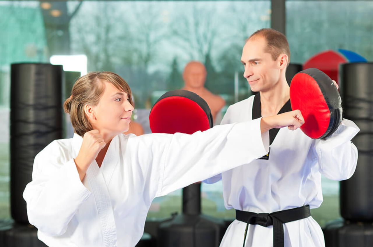 Martial arts instructor with kids